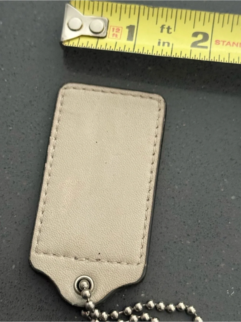 Coach Leather Hang Tag in Light Beige